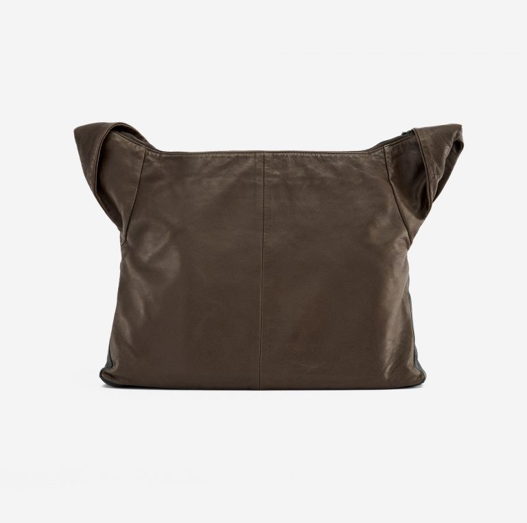 Backside of a pre-loved Chanel Girl Medium Lambskin in Brown and Black on SACLÀB