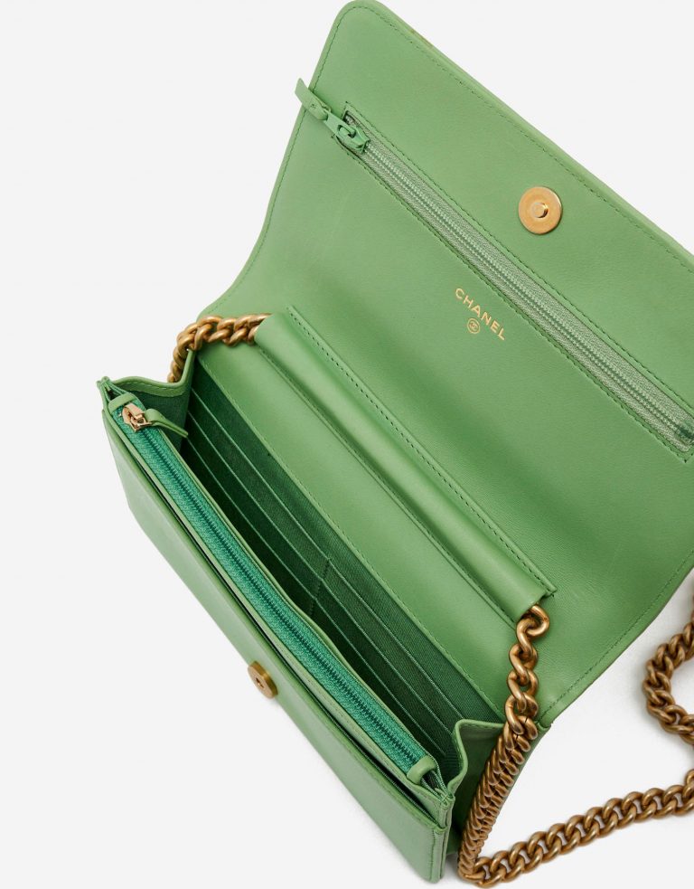 Opened Flap of a pre-loved Chanel Boy Wallet on Chain Lambskin in Light Green on SACLÀB
