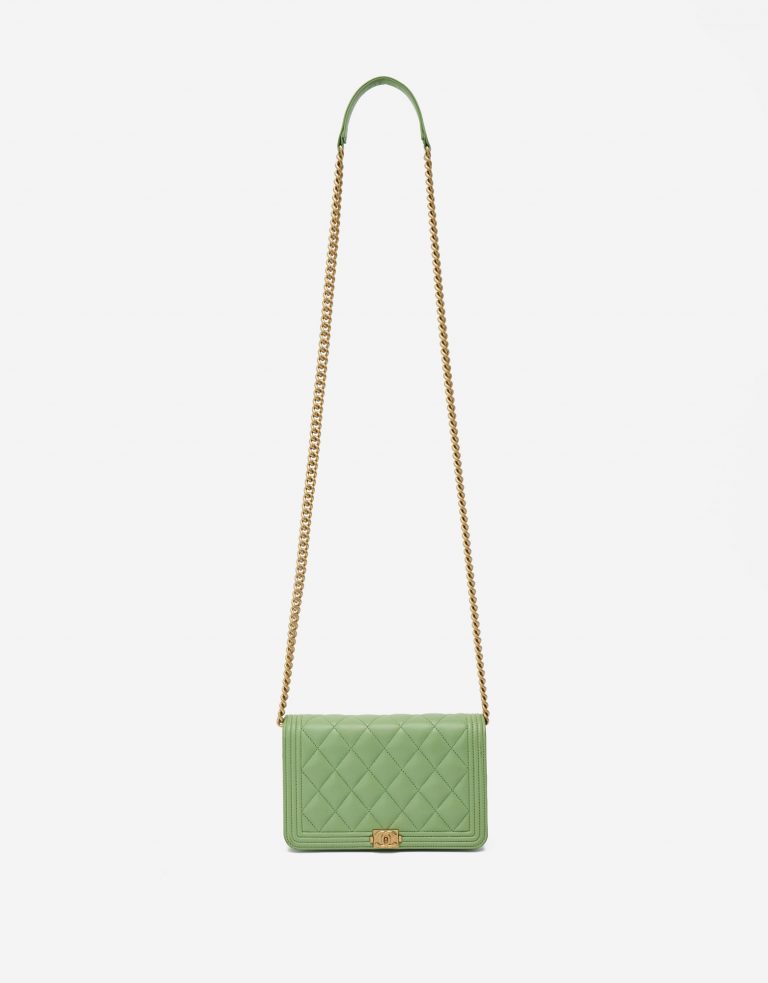 Crossbody chain strap of a pre-loved Chanel Boy Wallet on Chain Lambskin in Light Green on SACLÀB