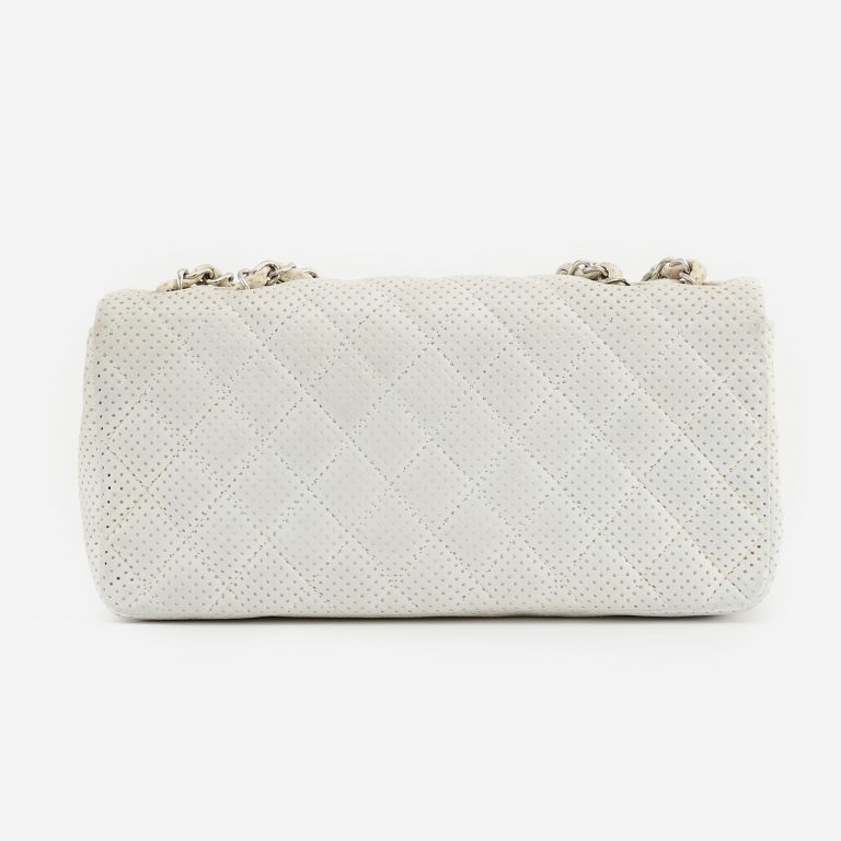 Backside of a pre-loved Chanel Timeless Baguette Lamb Off White on SACLÀB