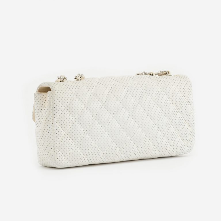 Backside of a pre-loved Chanel Timeless Baguette Lamb Off White on SACLÀB