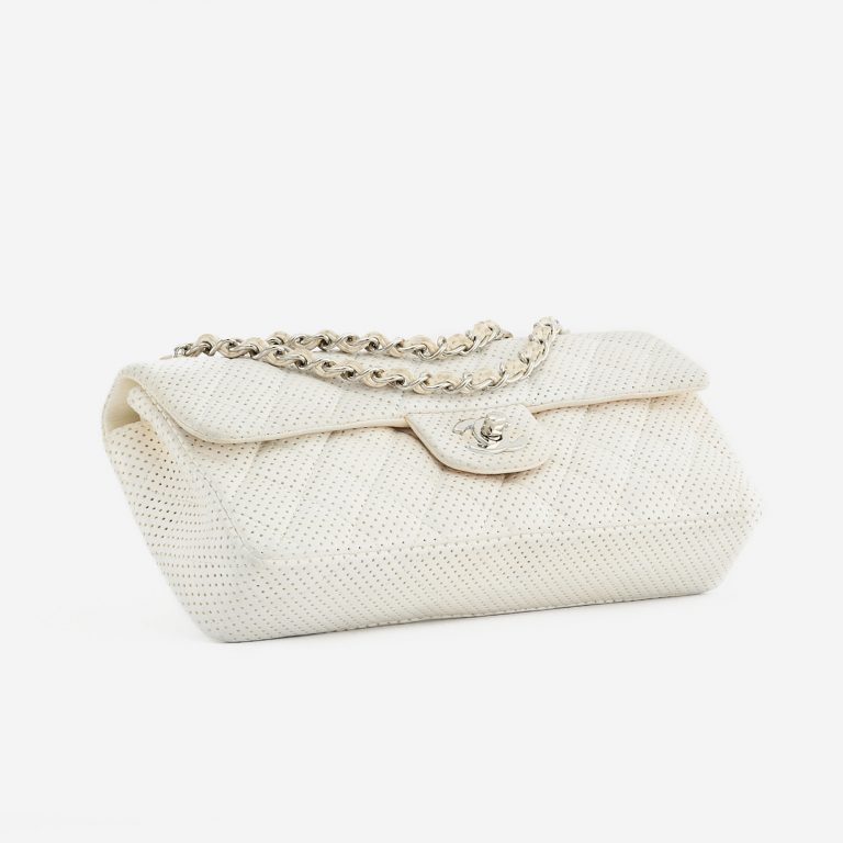Bottom perspective of a pre-loved Chanel Timeless Baguette Lamb Off White on SACLÀB