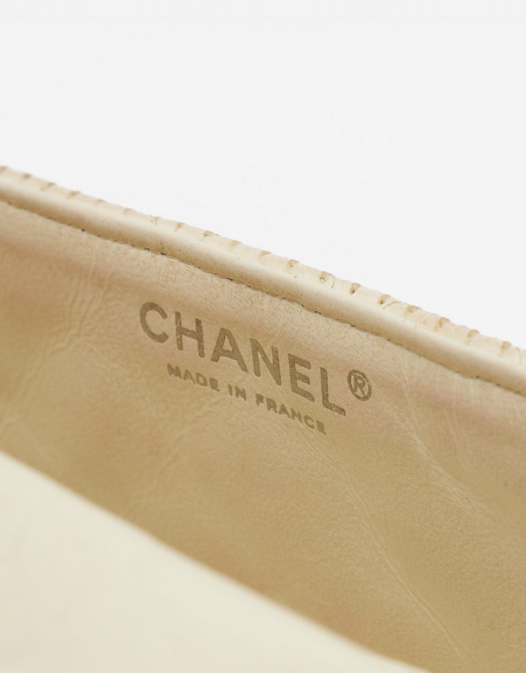 Chanel "Made in France" logo of a pre-loved Chanel Timeless Baguette Lamb Off White on SACLÀB