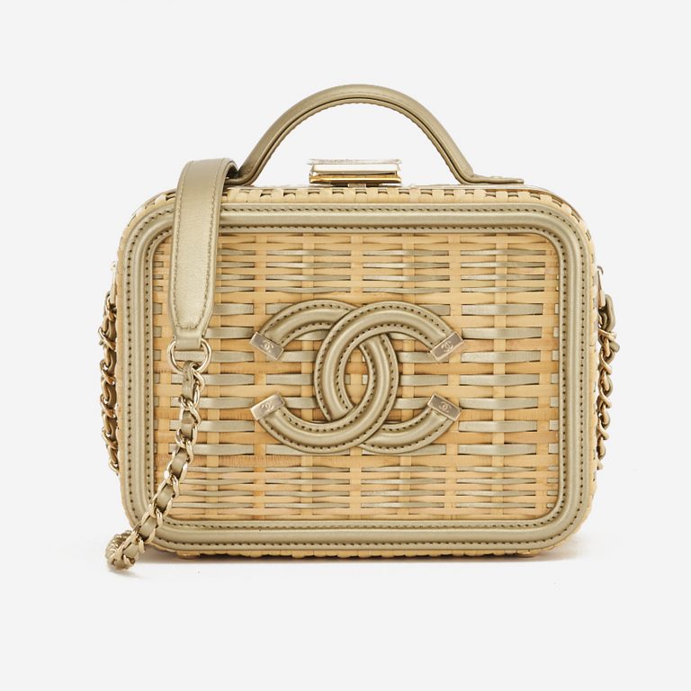 A pre-loved small Chanel Vanity Case in Beige Straw and Gold Leather on SACLÀB