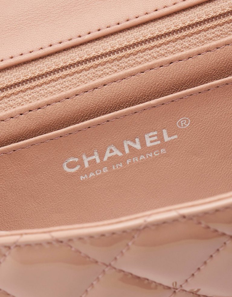 A pre-loved Chanel Timeless Mini Square in Nude Patent Leather on SACLÀB