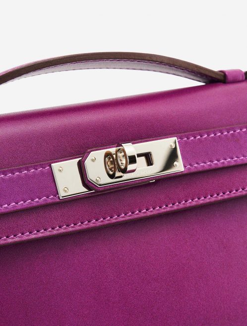 A pre-loved Hermès Kelly Cut Clutch in Anemone Swift Leather on SACLÀB