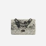A pre-loved Chanel 2.55 Reissue 226 Tweed White Black Garden Charms on SACLÀB