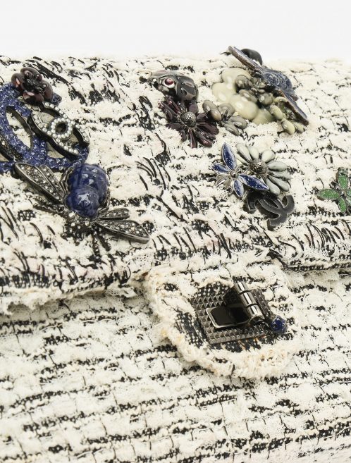 Hardware on a pre-loved Chanel 2.55 Reissue 226 Tweed White Black Garden Charms on SACLÀB