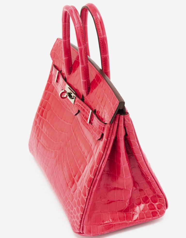 A pre-loved Hermès Birkin 25 Niloticus Crocodile Lisse Rose Extreme on SACLÀB