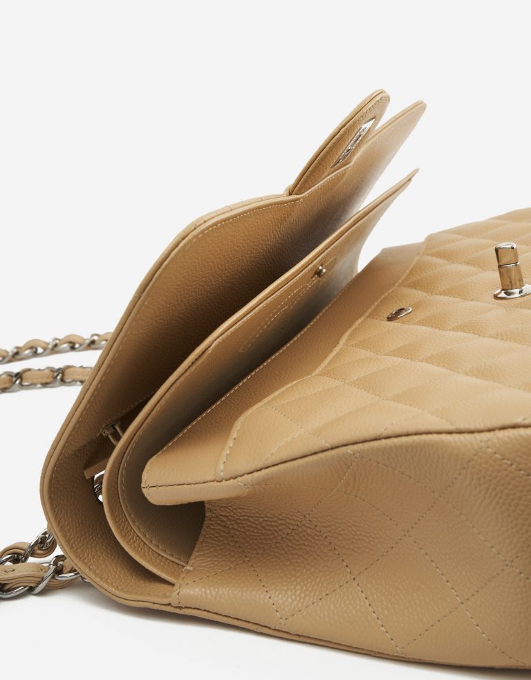 A pre-loved Chanel Timeless Jumbo Caviar Beige on SACLÀB