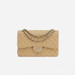 A pre-loved Chanel Timeless Jumbo Caviar Beige on SACLÀB