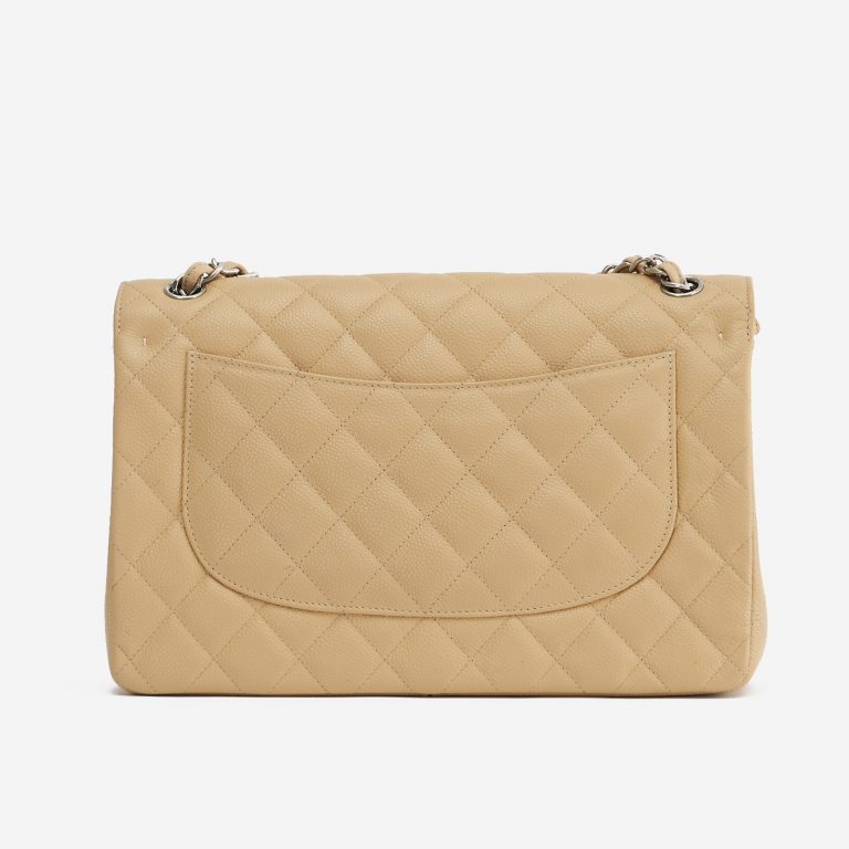 A pre-loved Chanel Timeless Jumbo Caviar Beige on SACLÀB