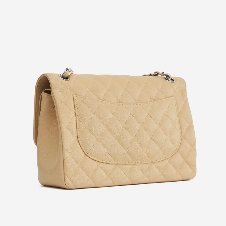 A pre-loved Chanel Timeless Jumbo Caviar Beige on SACLÀB