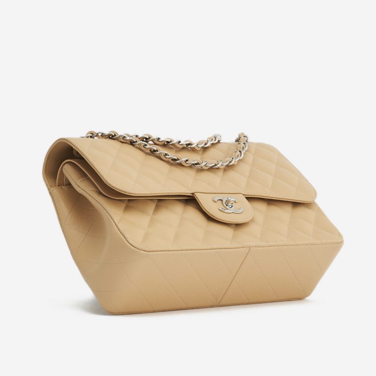 A pre-loved Chanel Timeless Jumbo Caviar Beige on SACLÀB