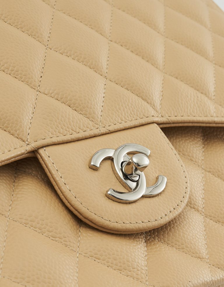 A pre-loved Chanel Timeless Jumbo Caviar Beige on SACLÀB