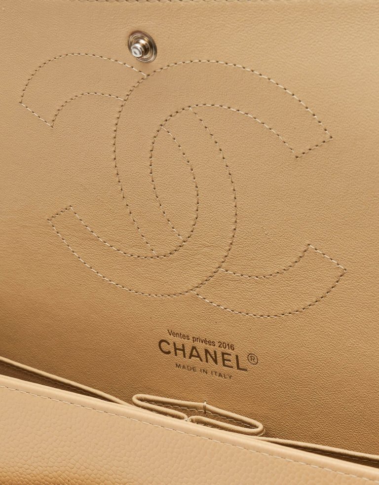 A pre-loved Chanel Timeless Jumbo Caviar Beige on SACLÀB