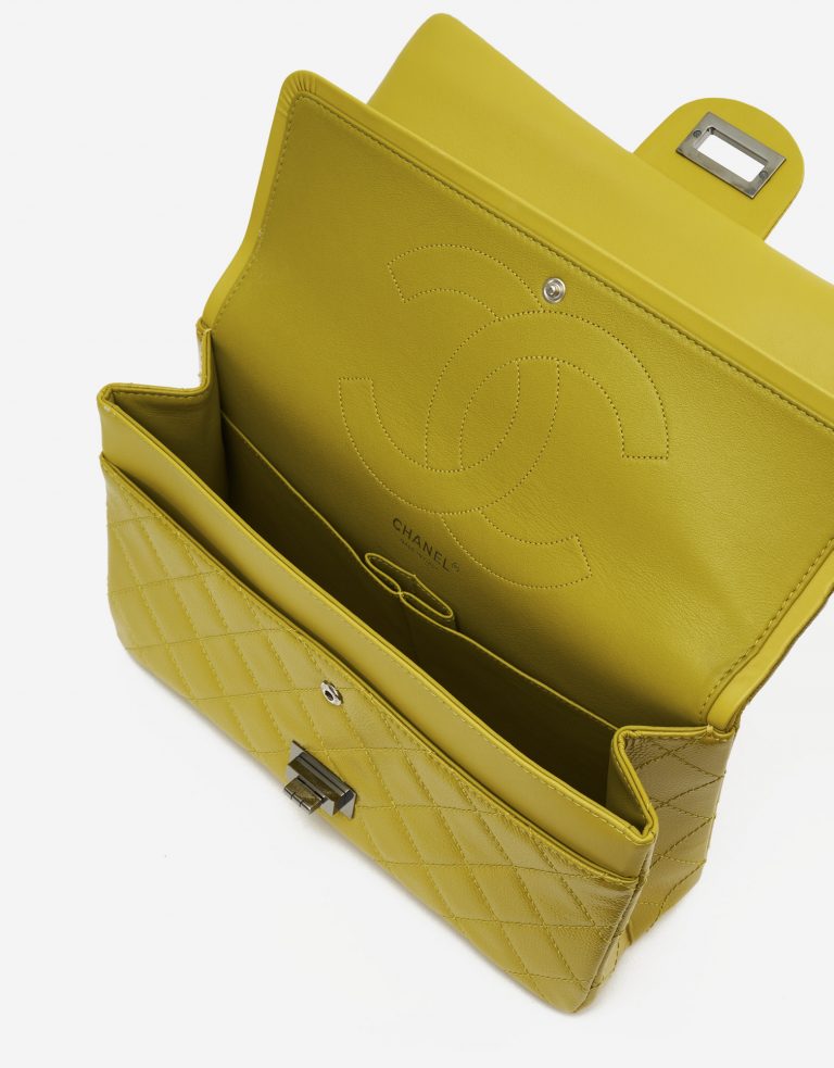 A pre-loved Chanel 2.55 Reissue 227 Patent Caviar Yellow on SACLÀB