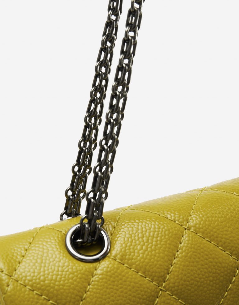 A pre-loved Chanel 2.55 Reissue 227 Patent Caviar Yellow on SACLÀB