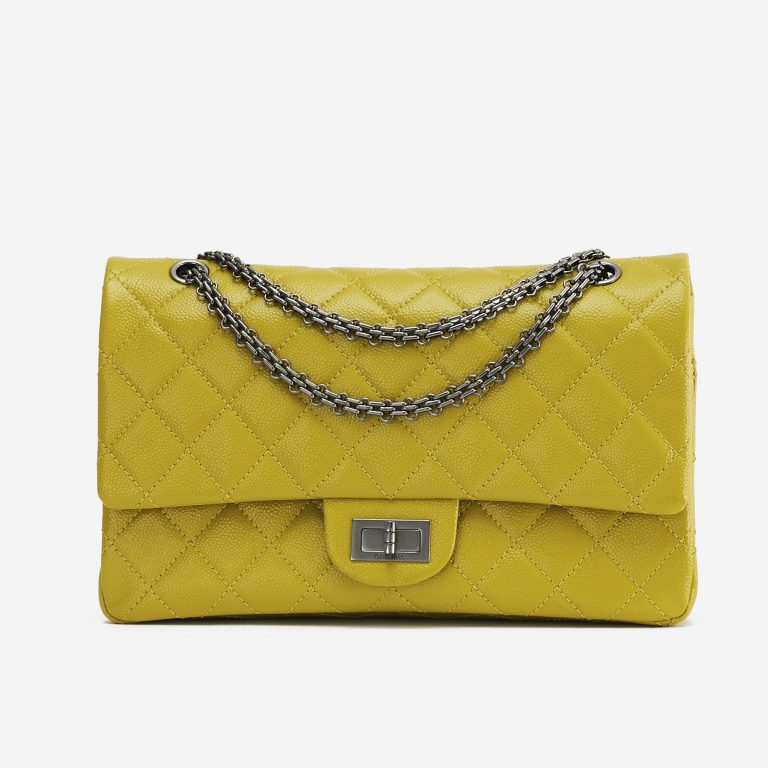 A pre-loved Chanel 2.55 Reissue 227 Patent Caviar Yellow on SACLÀB