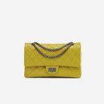 A pre-loved Chanel 2.55 Reissue 227 Patent Caviar Yellow on SACLÀB