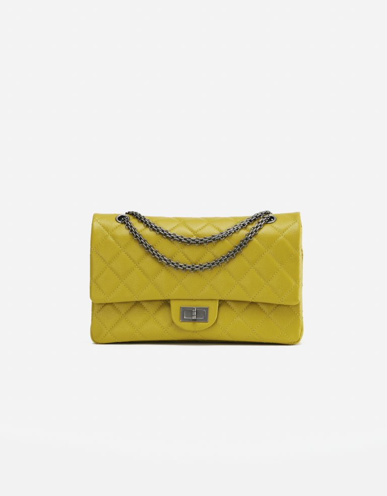 A pre-loved Chanel 2.55 Reissue 227 Patent Caviar Yellow on SACLÀB