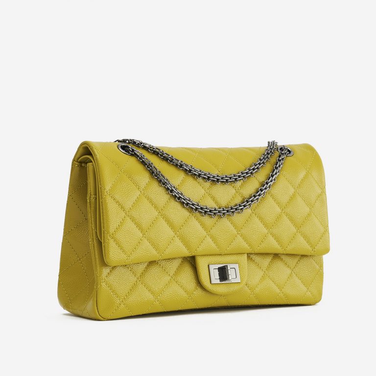 A pre-loved Chanel 2.55 Reissue 227 Patent Caviar Yellow on SACLÀB