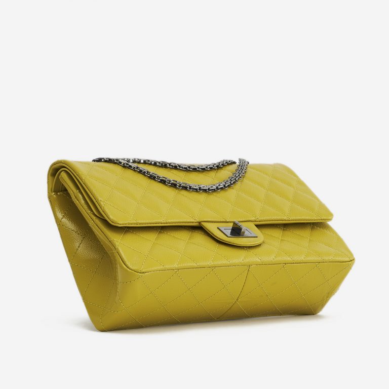A pre-loved Chanel 2.55 Reissue 227 Patent Caviar Yellow on SACLÀB