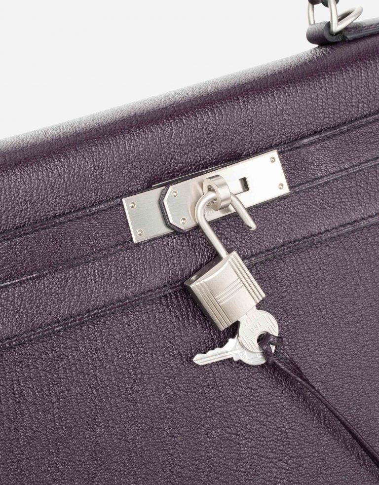 Pre-owned Hermès bag Kelly 28 HSS Brushed PHW Chevre Raisin / Black Violet | Sell your designer bag on Saclab.com