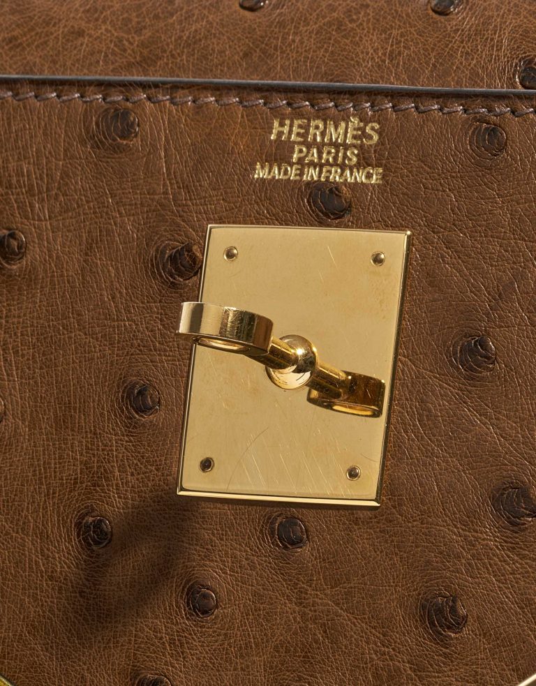 Pre-owned Hermès bag Kelly 32 Ostrich Marron / Vert Anis Brown, Green Logo | Sell your designer bag on Saclab.com