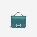 An exotic Hermès Constance 18 designed for seamless day-to-night dressing. It has been handcrafted from exquisite, matte alligator leather in Blue Paron topped with palladium-plated hardware. Produced in 2020 (“Y” stamp), it arrives in immaculate unworn condition. Make it the jewel in your bag collection.