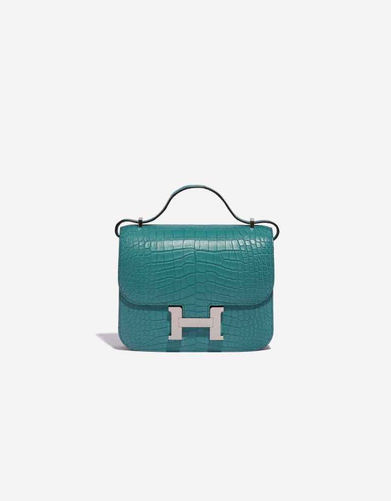An exotic Hermès Constance 18 designed for seamless day-to-night dressing. It has been handcrafted from exquisite, matte alligator leather in Blue Paron topped with palladium-plated hardware. Produced in 2020 (“Y” stamp), it arrives in immaculate unworn condition. Make it the jewel in your bag collection.