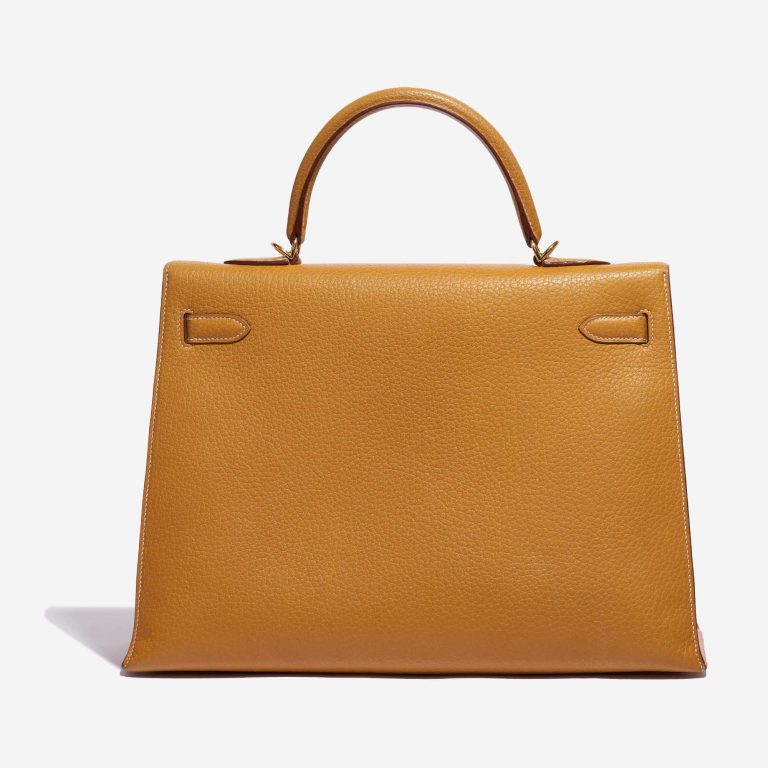 Pre-owned Hermès bag Kelly 35 Ardennes Moutarde Yellow Back | Sell your designer bag on Saclab.com