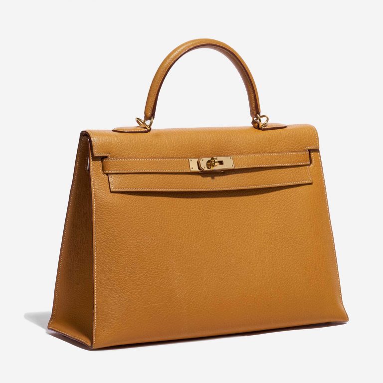 Pre-owned Hermès bag Kelly 35 Ardennes Moutarde Yellow Side Front | Sell your designer bag on Saclab.com