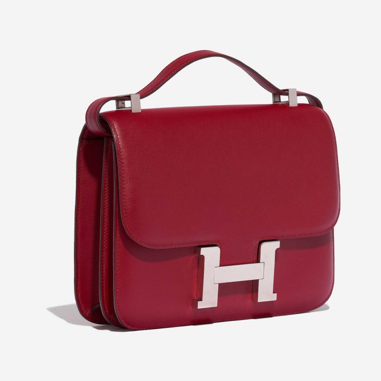 Pre-owned Hermès bag Constance 24 Swift Rubis Red Side Front | Sell your designer bag on Saclab.com