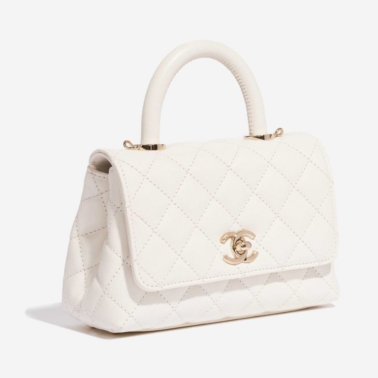 Pre-owned Chanel bag Timeless Handle Extra Mini Caviar White White Side Front | Sell your designer bag on Saclab.com