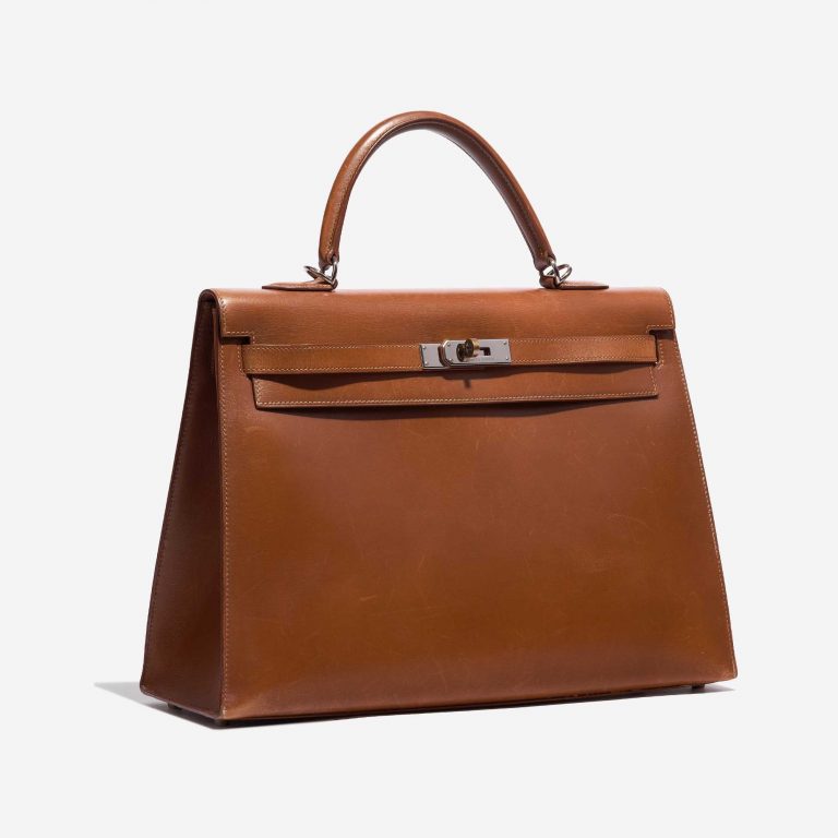 Pre-owned Hermès bag Kelly 35 Box Fauve Brown Side Front | Sell your designer bag on Saclab.com