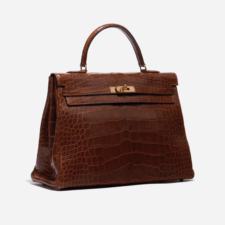 Pre-owned Hermès bag Kelly 35 Alligator Noisette Brown Side Front | Sell your designer bag on Saclab.com