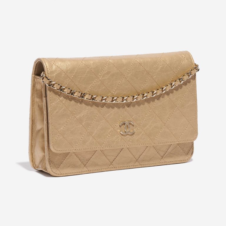 Pre-owned Chanel bag WOC Lamb Gold Gold Side Front | Sell your designer bag on Saclab.com