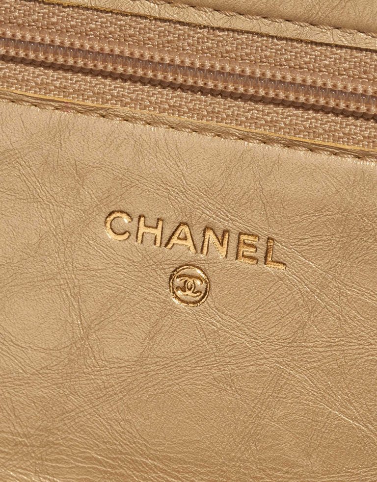 Pre-owned Chanel bag WOC Lamb Gold Gold Logo | Sell your designer bag on Saclab.com