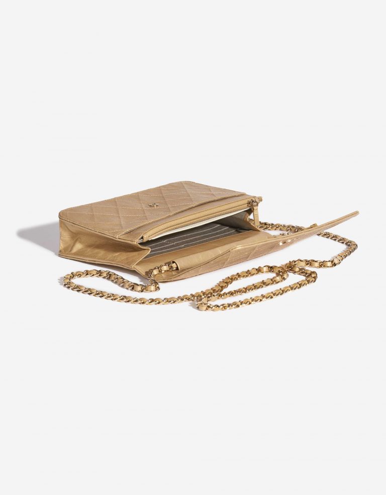 Pre-owned Chanel bag WOC Lamb Gold Gold Inside | Sell your designer bag on Saclab.com