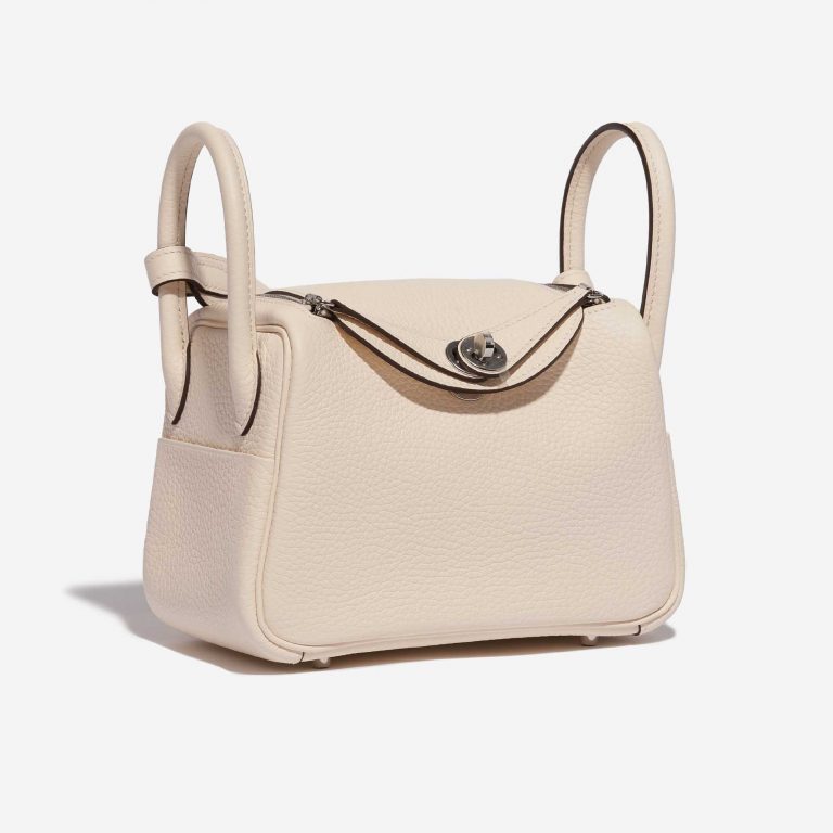 Pre-owned Hermès bag Lindy Mini Clemence Nata Beige, White Side Front | Sell your designer bag on Saclab.com