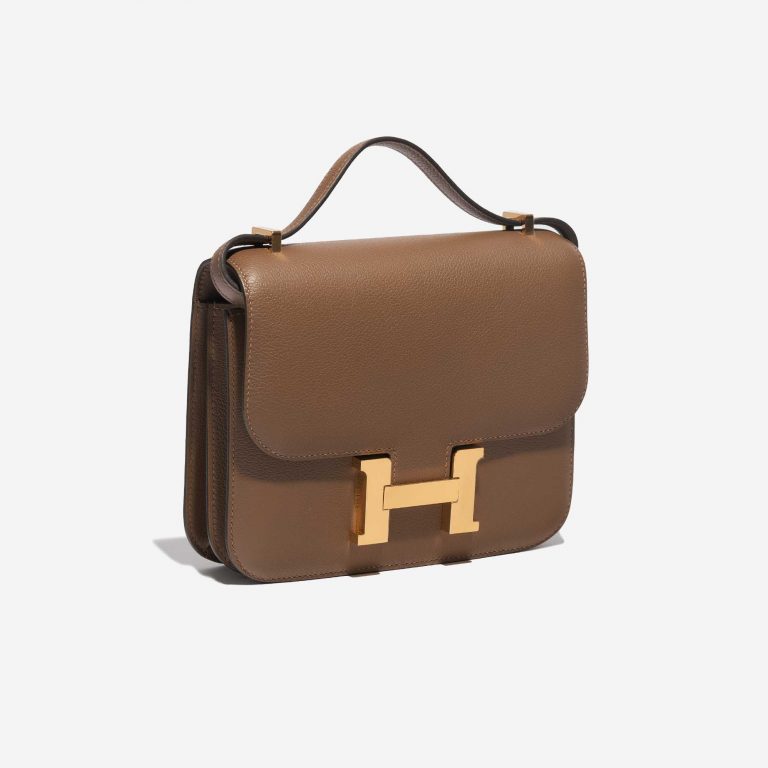Pre-owned Hermès bag Constance 18 Evercolor Beige de Weimar Brown Side Front | Sell your designer bag on Saclab.com