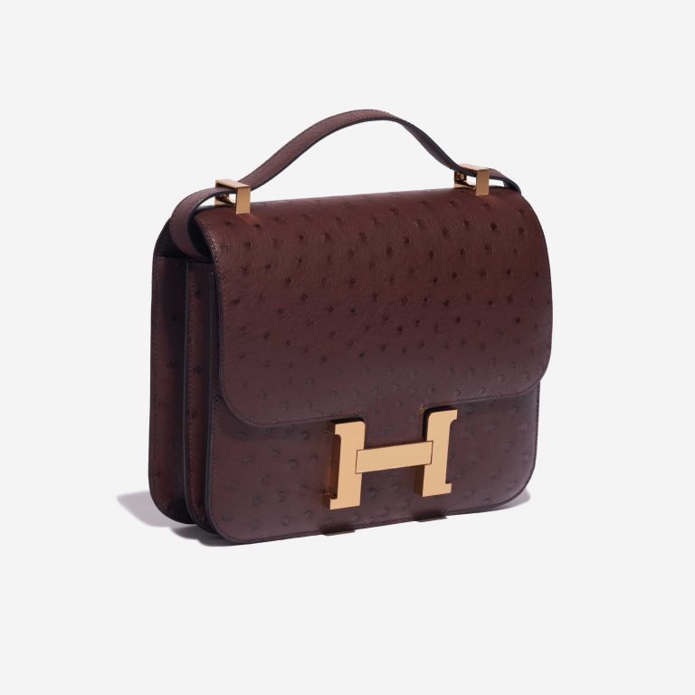 Pre-owned Hermès bag Constance 24 Ostrich Rouge Sellier Brown Side Front | Sell your designer bag on Saclab.com