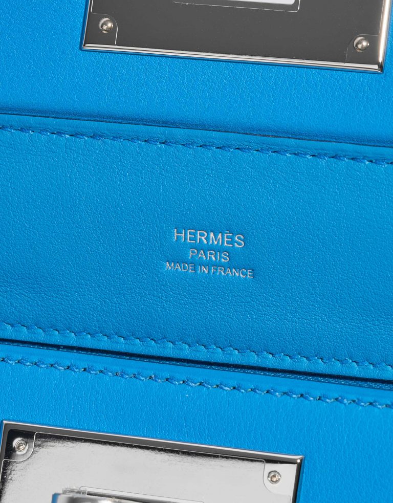 Pre-owned Hermès bag 24/24 21 Evercolor/ Swift Blue Frida Blue Logo | Sell your designer bag on Saclab.com