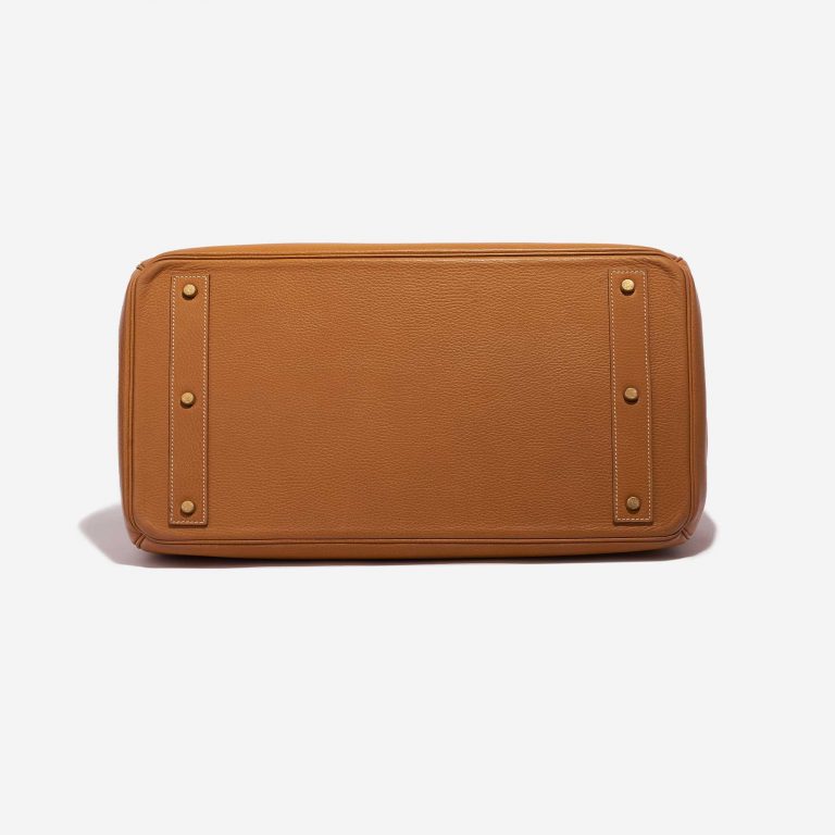 Pre-owned Hermès bag Haut à Courroies 45 Vache Ardennes Gold Brown Bottom | Sell your designer bag on Saclab.com