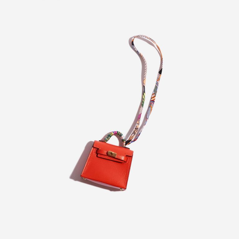 Pre-owned Hermès bag Kelly Micro Tadelakt / Silk Capucine / Vieux Rose Red Front | Sell your designer bag on Saclab.com
