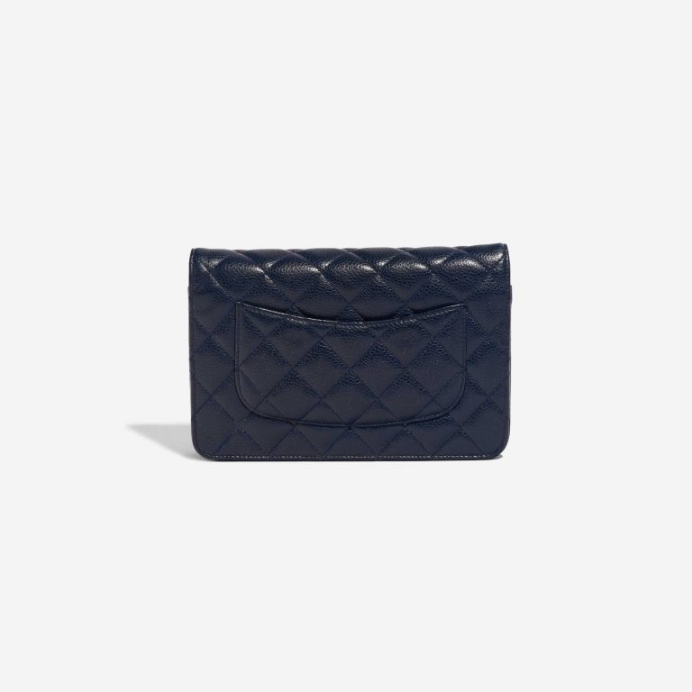 Pre-owned Chanel bag Timeless WOC Caviar Dark Blue Blue Back | Sell your designer bag on Saclab.com