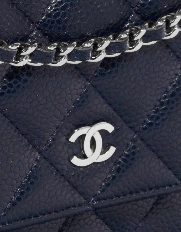 Pre-owned Chanel bag Timeless WOC Caviar Dark Blue Blue Closing System | Sell your designer bag on Saclab.com