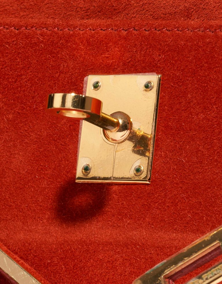 Pre-owned Hermès bag Kelly Pochette Doblis Suede Rouge Vif Red Logo | Sell your designer bag on Saclab.com