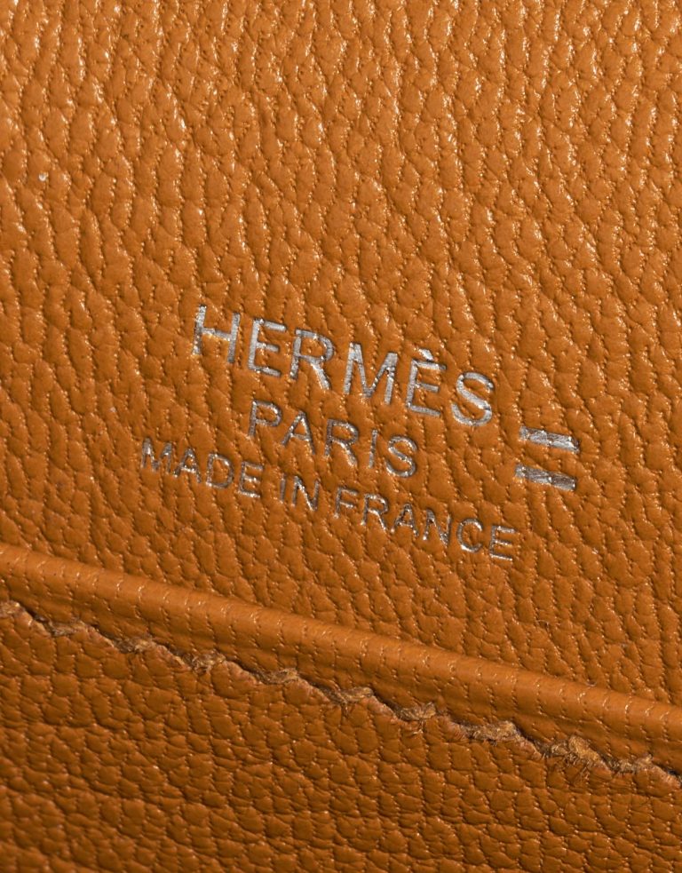 Pre-owned Hermès bag Roulis Mini Lizard Ombre Caramel Brown Logo | Sell your designer bag on Saclab.com